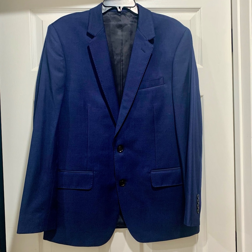 The Black Tux suit set in blue.